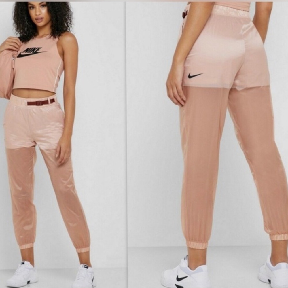 Nike Women’s Rose Gold Clay Burgundy Tech Pack Sheer Woven Pants‎